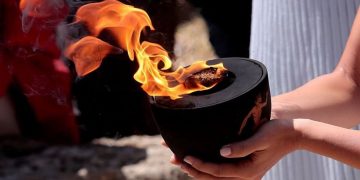 Flacăra Olimpică a fost aprinsă într-o ceremonie fără spectatori