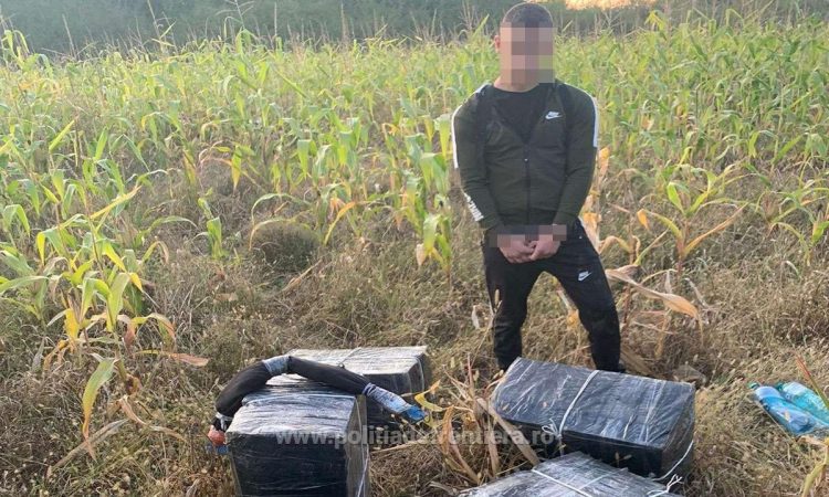 Focuri de armă, ucrainean reţinut cu mai multe colete cu ţigări în spinare și peste 5.000 pachete cu țigări confiscate la frontiera de nord
