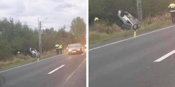 O maşină a ajuns cu roţile în sus la ieşirea din Buşag – foto