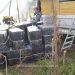 Percheziţii domiciliare. Patru maramureşeni cercetaţi şi 18.000 pachete țigări confiscate la Sarasău