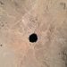 GALERIE FOTO: O misterioasă gaură apărută în deșert îi fascinează pe geologi. Oamenii locului se tem de demonii din „gura iadului”