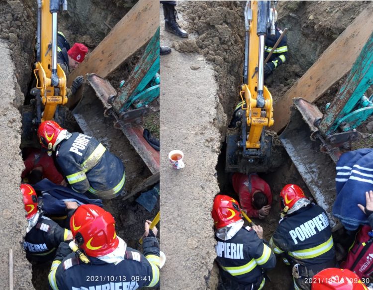 IMAGINI de la intervenţia de salvare a unui bărbat blocat într-o canalizare de un mal de pământ (ACTUALIZARE)