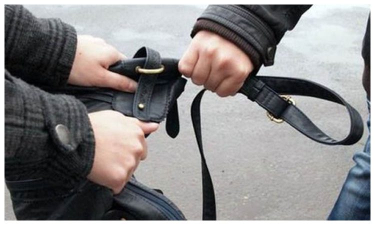 Băimărean reţinut după ce a urmărit şi a tâlhărit doi bătrâni în scara unui bloc