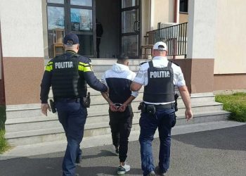 Bătută cu bestialitate pe o stradă din Baia Sprie, în văzul tuturor. Agresorul, reţinut de poliţişti